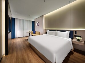 Habitación Deluxe doble, vistas a la ciudad | Cortinas opacas y sistema de insonorización