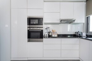 Appartement Luxe, vue ville | Cuisine privée