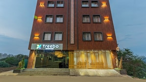 A multi-story building with a sign reading 'treebo SLOKA RESIDENCY.' - Treebo Sloka Residency (Ranchi)