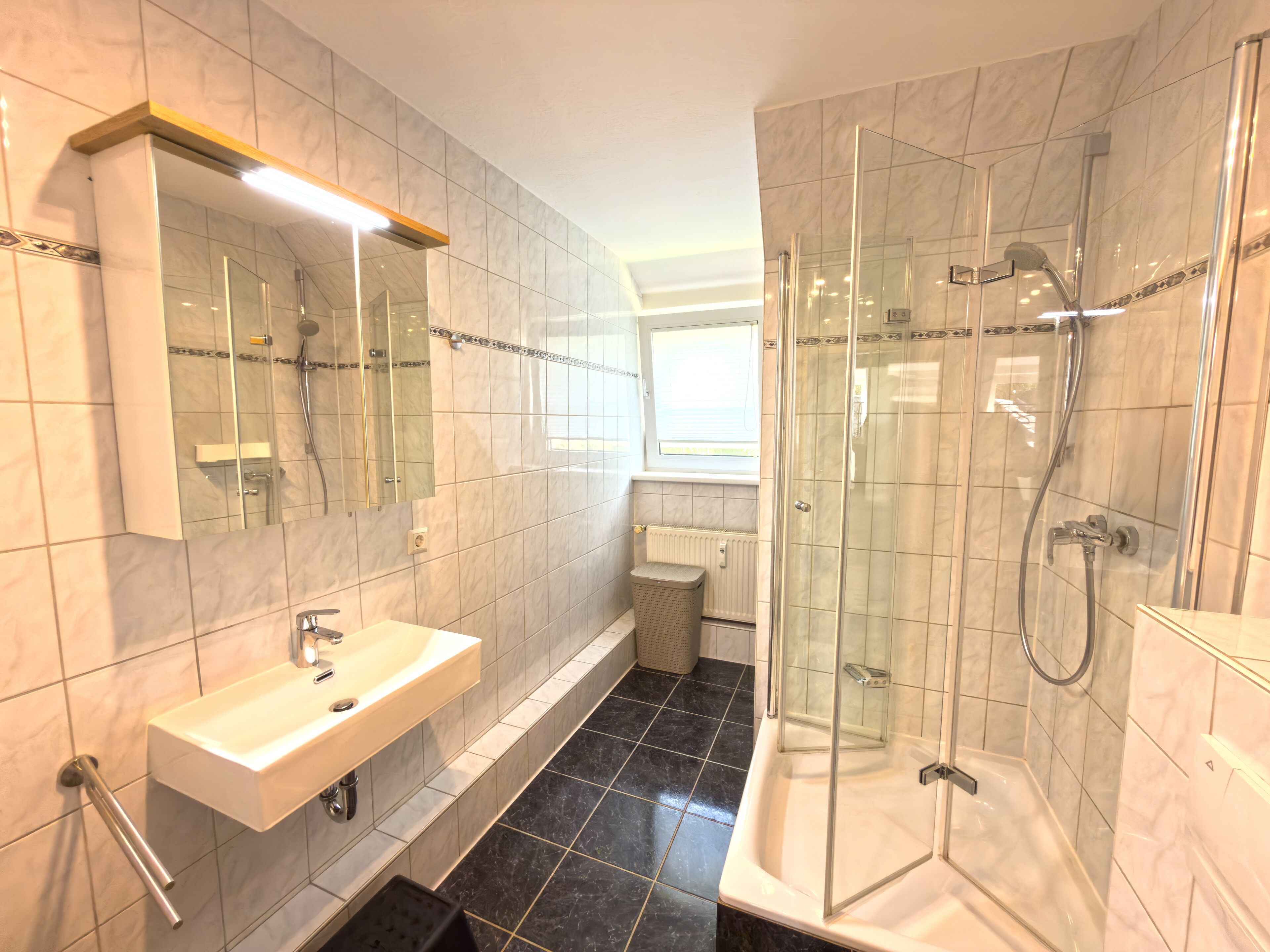 Shower, hair dryer, towels, toilet paper