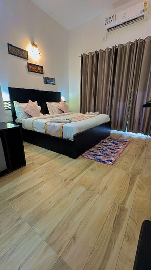Deluxe Room | Rollaway beds, free WiFi, bed sheets -  Pearl Suites at Omex Enternity (Mathura)