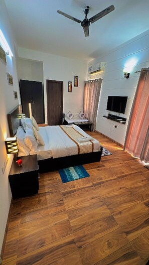 Deluxe Room | Rollaway beds, free WiFi, bed sheets -  Pearl Suites at Omex Enternity (Mathura)
