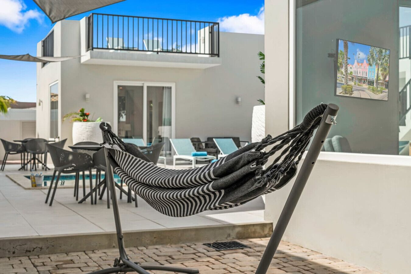 Shaded patio with hammock for laid back Aruba moments