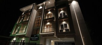 Cozy 2-bedroom apartment in pleasant Mangaluru with AC
