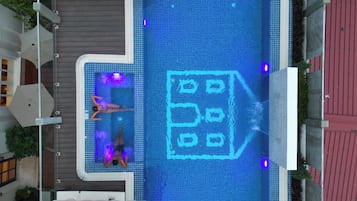 Outdoor pool, open 10:00 AM to 10:00 PM, pool umbrellas, pool loungers