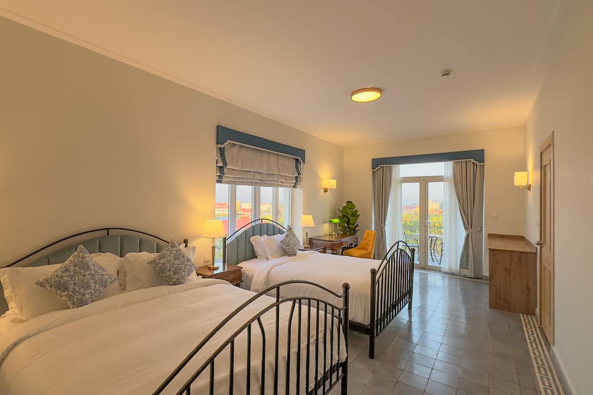 Family Suite, Balcony, City View | Down comforters, memory foam beds, minibar, in-room safe