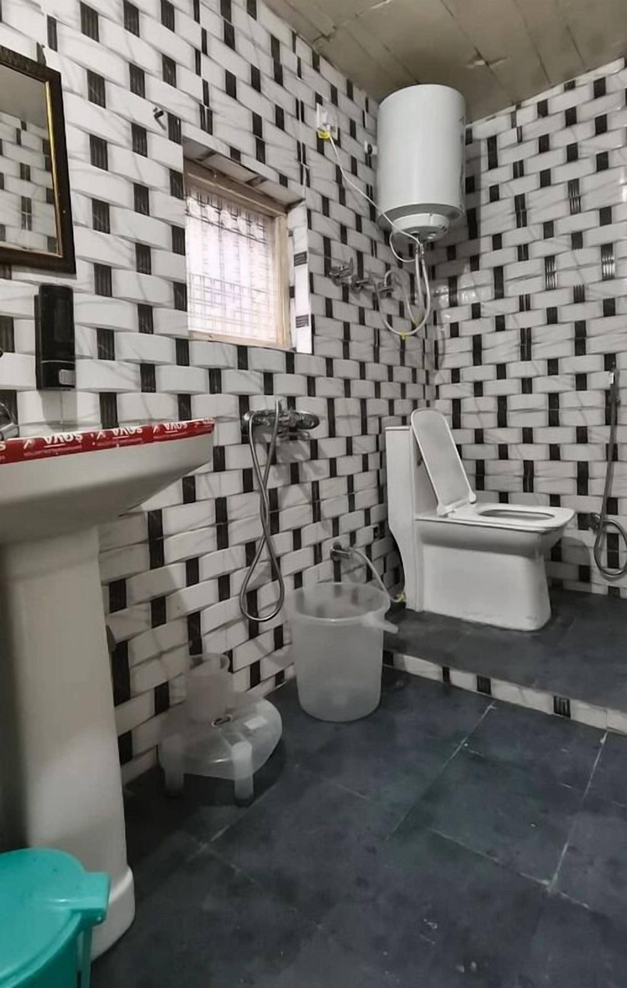 Quadruple Room | Bathroom | Shower, towels, toilet paper