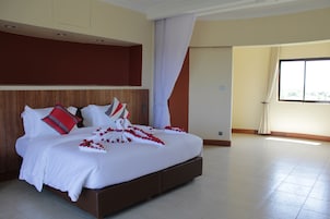 Habitación ejecutiva con 1 cama doble o 2 individuales, vistas al parque | Ropa de cama de alta calidad, escritorio, cortinas opacas