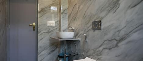 Shower, bidet, towels, soap
