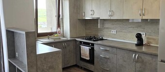 Modern Apartment Near City Center – Heated Floors & New Building