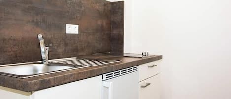 Refrigerador y parrilla de estufa