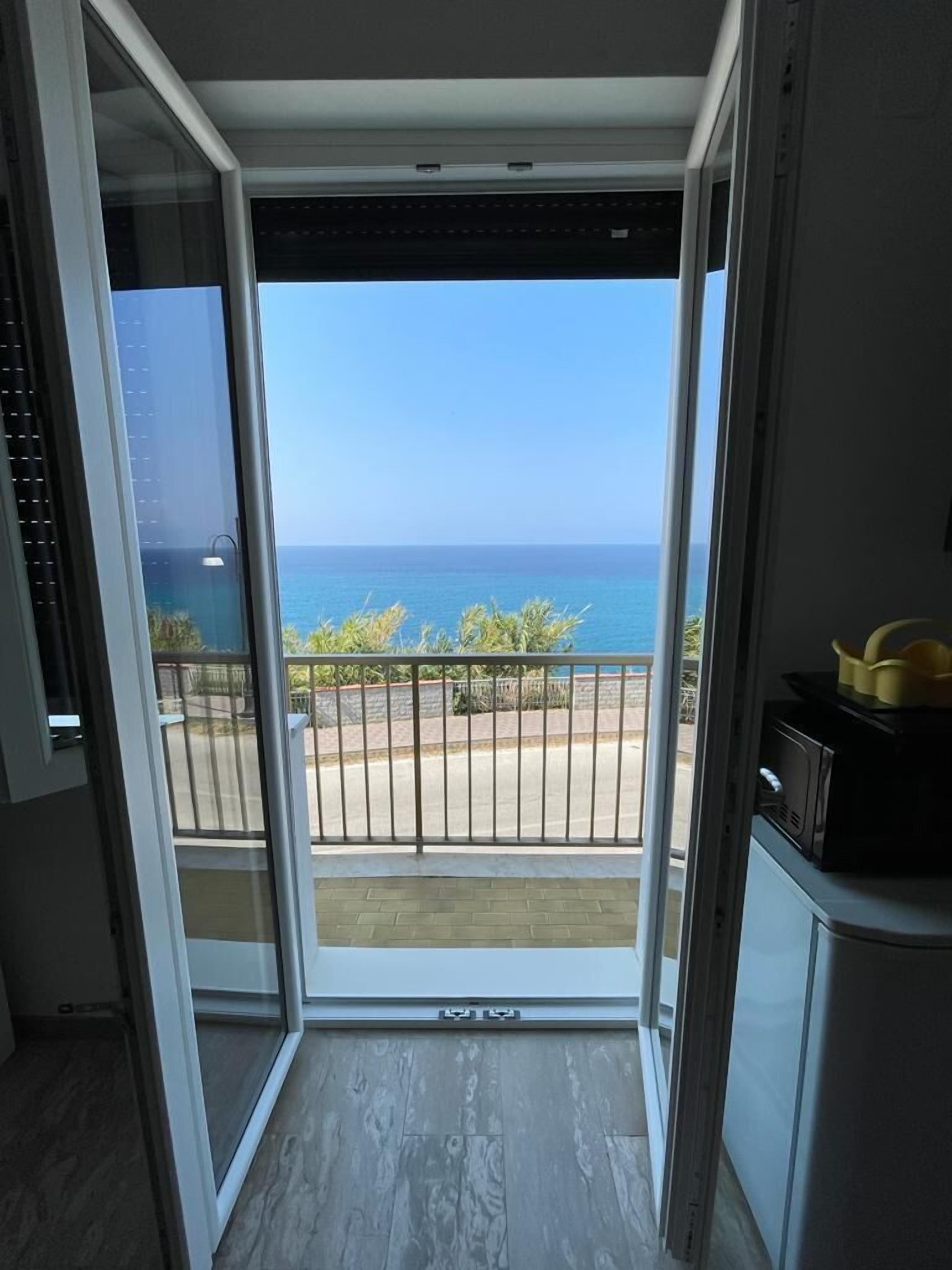 غرفة ديلوكس مزدوجة - بشرفة - بمنظر للبحر | منطقة المعيشة