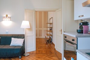 Apartment, 1 Queen Bed with Sofa bed, Patio, Garden View | Living area - SM Hospitality MONTE PASUBIO (Reggio nell'Emilia)