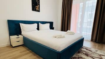 Tabla de planchar con plancha, Internet, ropa de cama