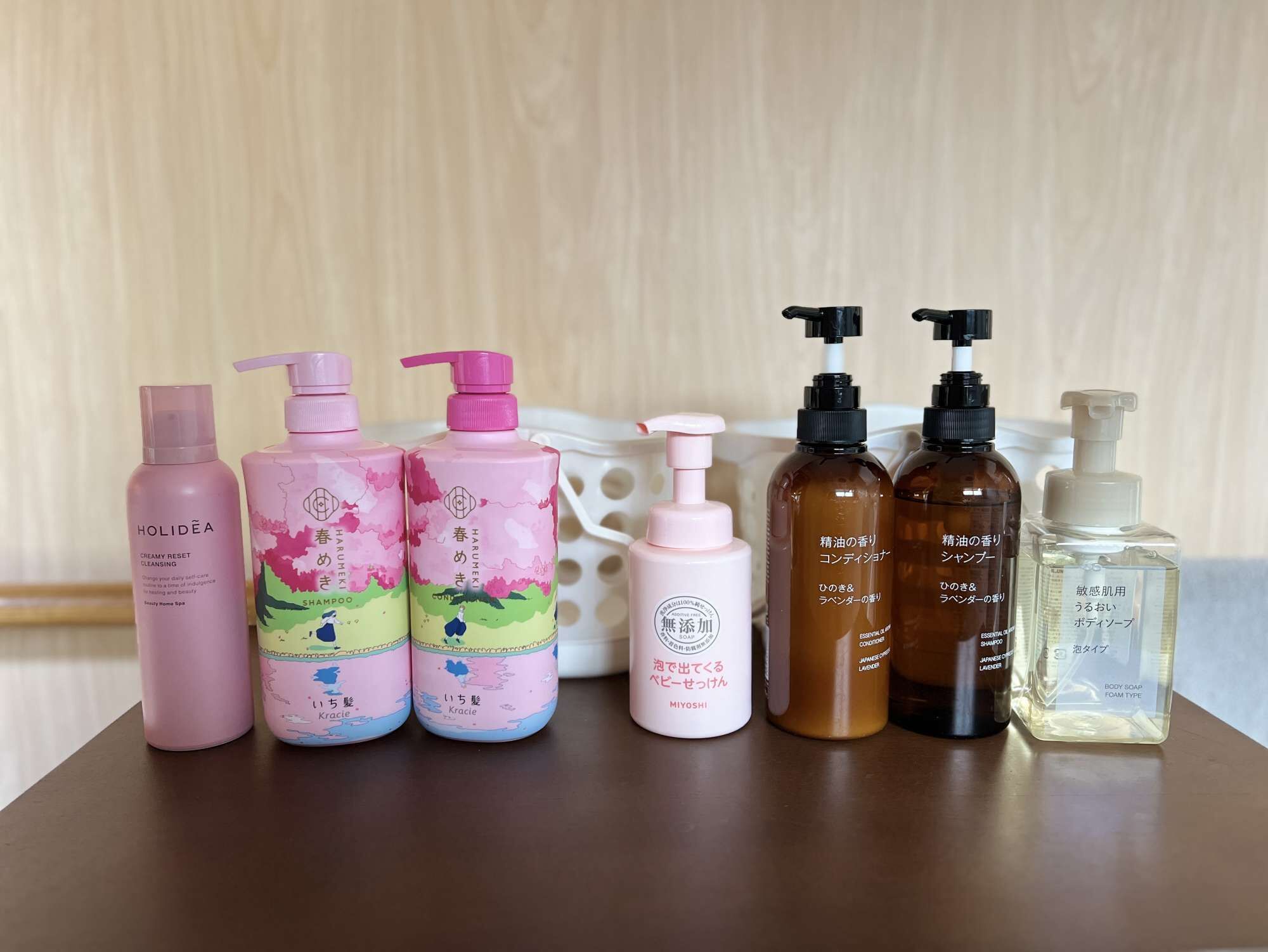 A variety of personal care products arranged on a table.