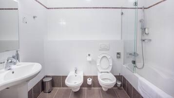 Family Studio, Garden View | Bathroom | Hair dryer, slippers, towels, soap