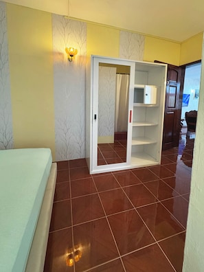Wardrobe with metal locker - Calm Nest 3-bedroom Apartment. 180m from the beach. Family and Business Trips! (Flic en Flac)