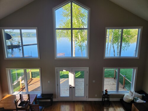 Waterfront home on stunning lake Cecebe luxury cathedral ceilings cozy fireplace