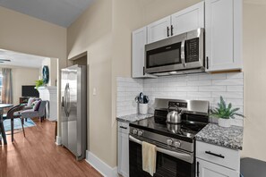 Fridge, microwave, oven, stovetop - Laurel Charm is a cozy home with eclectic charm in the heart of Augusta. Featuring 3 beds 2 baths, and space to sleep up to 8 guests, it’s perfect for families, friends, and traveling professionals. Pet-friendly, just minutes from downtown Augusta. (Augusta)