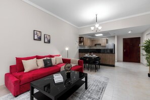 Apartamento luxo, 1 quarto, para não fumantes, sacada | Área de estar