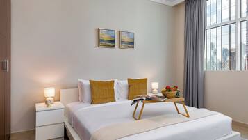 Apartamento luxo, 1 quarto, para não fumantes, sacada | Cofres nos quartos, cortinas blackout, ferros/tábuas de passar roupa