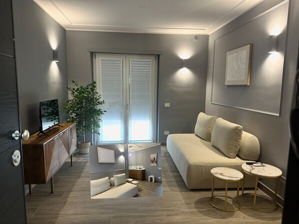 Deluxe Apartment, Balcony, Garden View | Living area - NLM nouvelle maison (Rome)