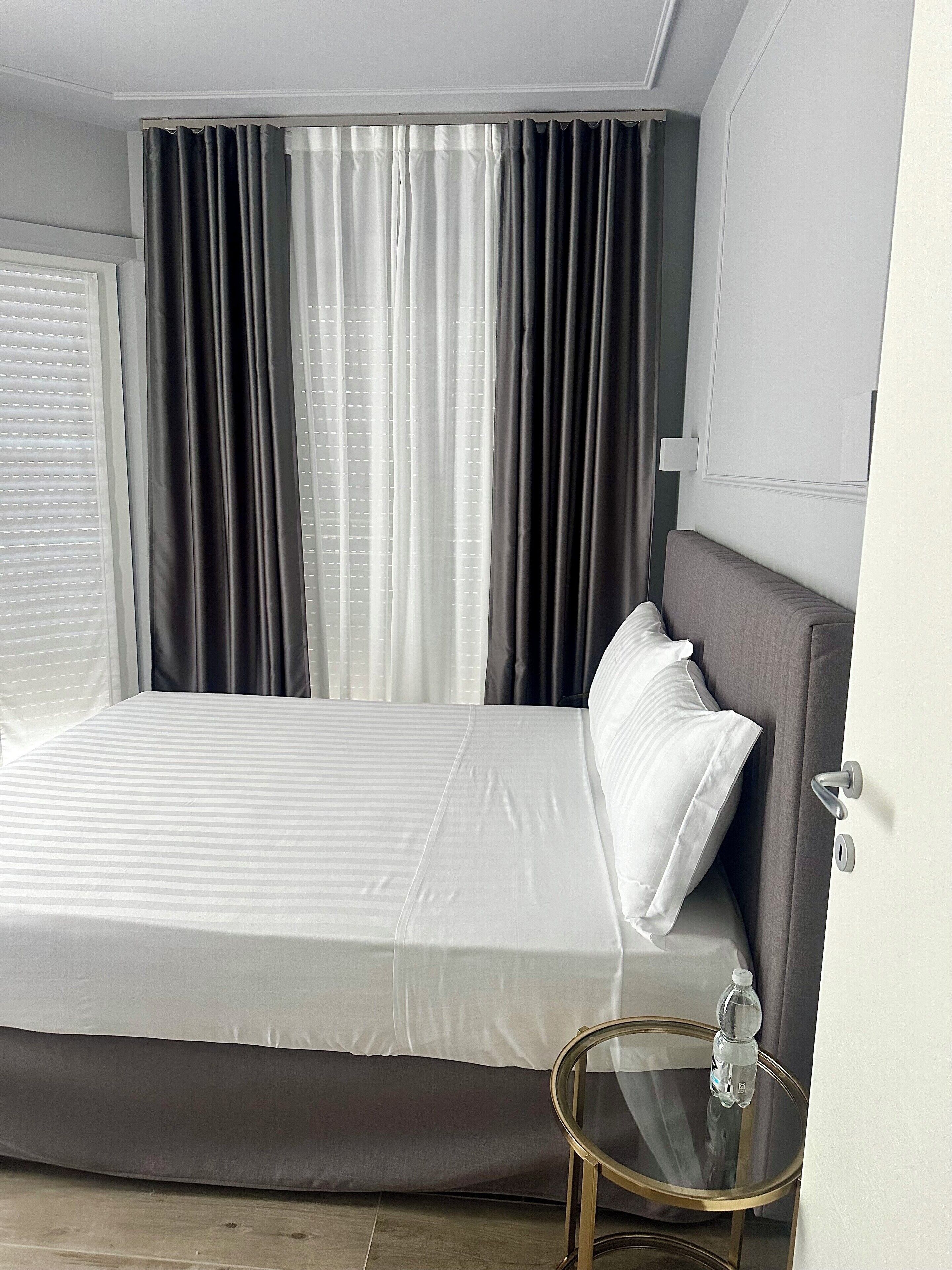 Comfort Room, Garden View | In-room safe, desk, soundproofing, iron/ironing board