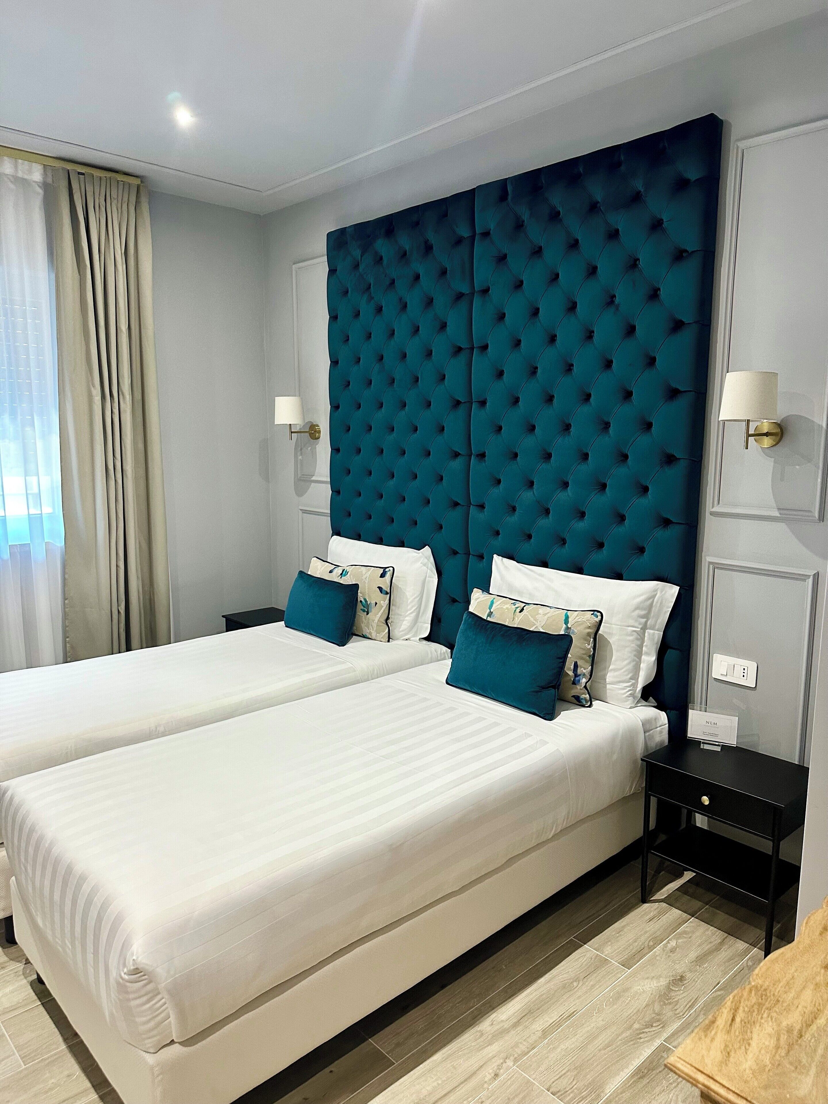 Deluxe Twin Room, Garden View | In-room safe, desk, soundproofing, iron/ironing board