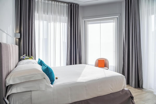 Deluxe Apartment, Balcony, Garden View | Frette Italian sheets, premium bedding, minibar, in-room safe