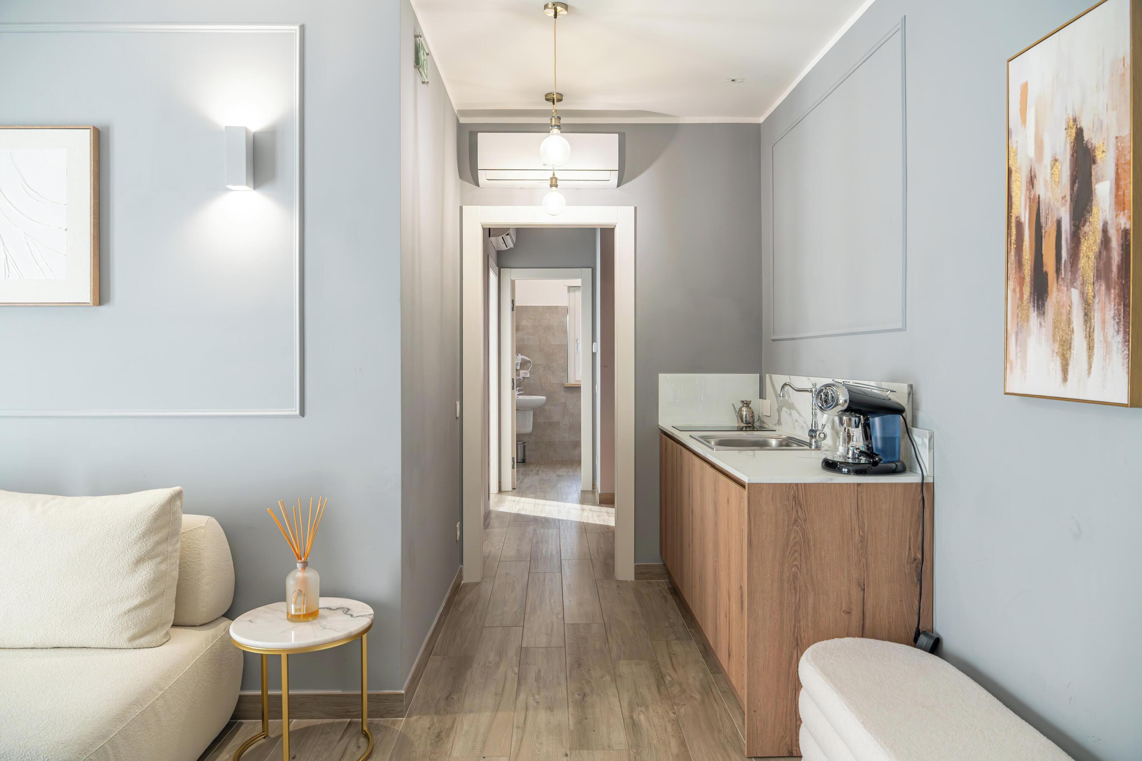 Deluxe-Apartment, Balkon, Gartenblick | Wohnbereich