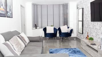 Maison, 4 chambres, patio | Salle de séjour