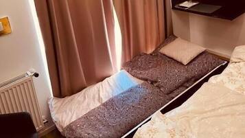 Chambres insonorisées, fer et planche à repasser, Wi-Fi gratuit