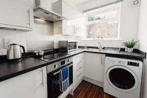 Fridge, microwave, electric kettle, toaster