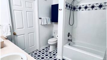 Hair dryer, towels, soap, toilet paper