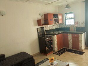 Private kitchen - Affordable & stylish 1 bedroom Diani Treasured Home, an apartment near the Beach (Diani)