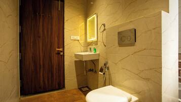 Shower, towels, toilet paper