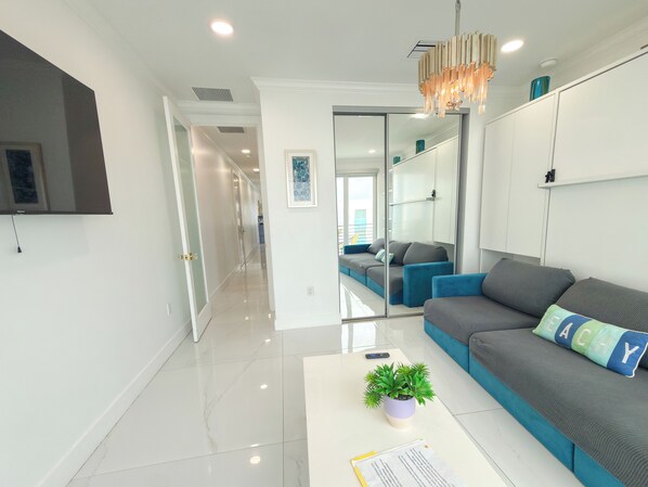 Living area - Stylish Coastal Escape w/ Balcony Views (Lauderdale-by-the-Sea)