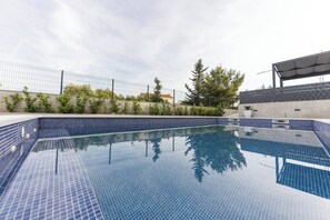 อพาร์ทเมนท์, 2 ห้องนอน, วิวสวน | สระว่ายน้ำ | สระว่ายน้ำกลางแจ้ง