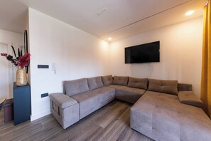 Apartment, 2 Schlafzimmer, Gartenblick | Wohnzimmer