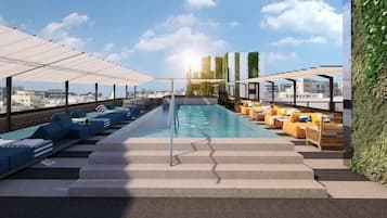 Piscina externa, salva-vidas no local