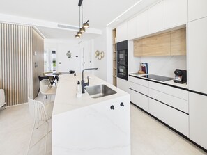 Fridge, microwave, oven, stovetop - Luxury apt, Europe's largest lagoon, heated pool, Santa Rosalia Lake Resort. (MC)