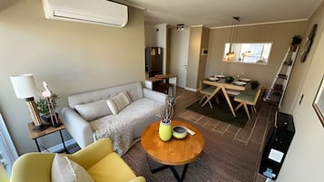 Apartemen | Area keluarga | TV layar datar