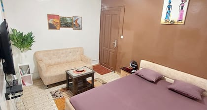 Cosy air-conditioned mini studio | Wi-Fi | Balcony | AIBD