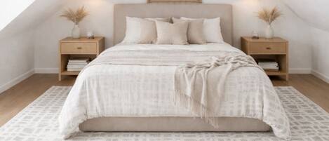 Tabla de planchar con plancha, wifi y ropa de cama