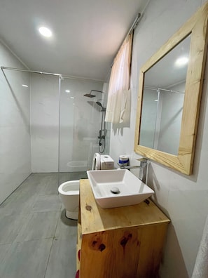 Double Room, Balcony, Lake View | Bathroom | Shower, towels, toilet paper