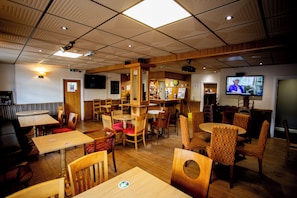 Dining - Disabled-access king-sized room in a friendly 1852 pub and 4-star B&B. (Mountain Ash)