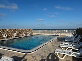 Outdoor pool, open 7:00 AM to 9:00 PM, sun loungers