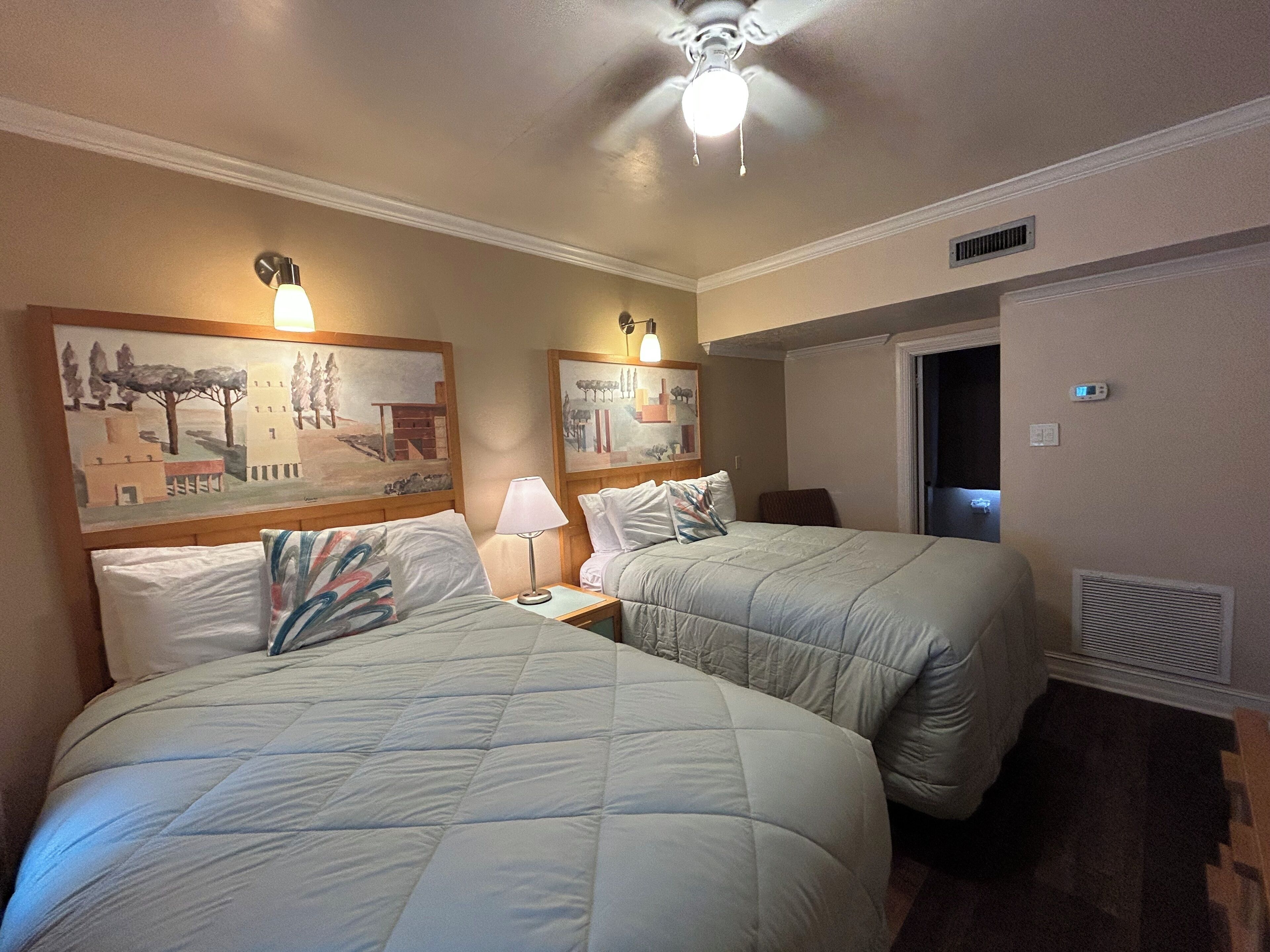 Apartment, 2 Double Beds, Courtyard View, Beachside | Desk, laptop workspace, bed sheets