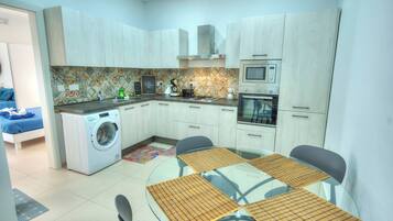 Apartamento, vistas al mar | Cocina privada