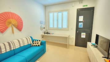 Apartamento, vistas al mar | Zona de estar